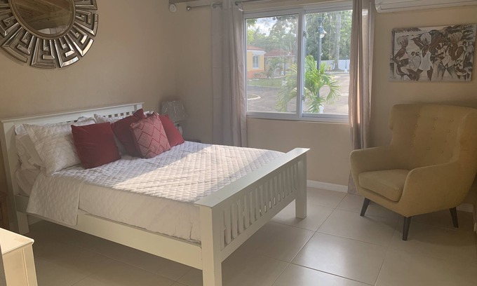 Montego Bay Cottage | Palm Breeze Cottage -GATED COMMUNITY, Pool, Beach Access, HipStrip, NEAR AIRPORT