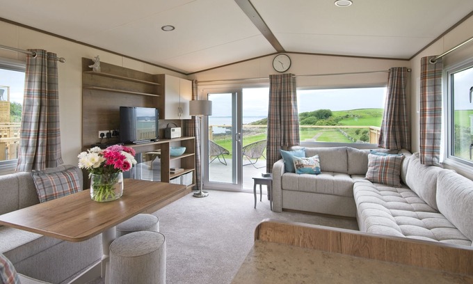 Castle Douglas Cottage | Pebbles - a static caravan that sleeps 6 guests in 3 bedrooms