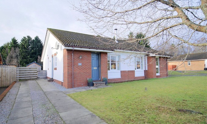 Aviemore Apartment | Pet friendly large four bedroom property with fire, sauna , enclosed garden with BBQ and views of th