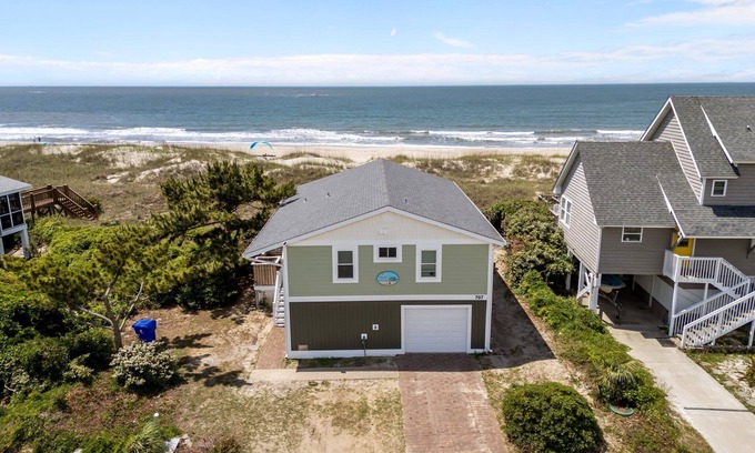 Caswell Beach House | Pet friendly private ocean front cottage nestled in peaceful Caswell Beach. Running Down A Dream