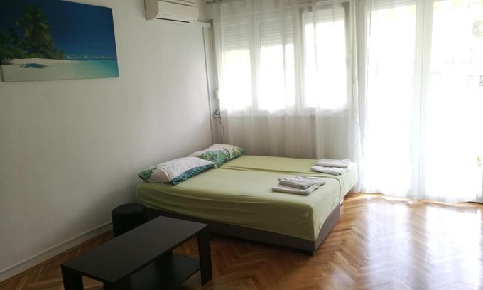 Vranjic House | Pretty big double bed room with balcony