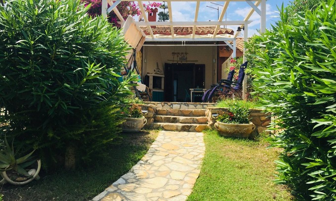 Costa Rei House | Pretty cottage with sea view within walking distance of the beach.