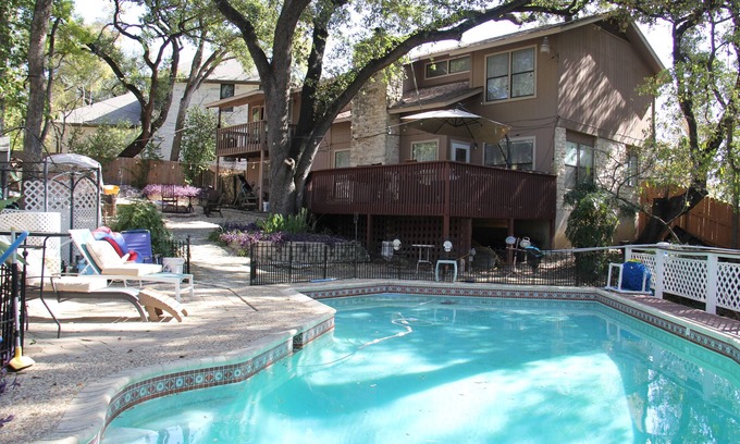 Woodhaven House | Private Austin Oasis, sleeps 10+, 4 Rooms, Game, Campfire, Playscape, Pool, Tent