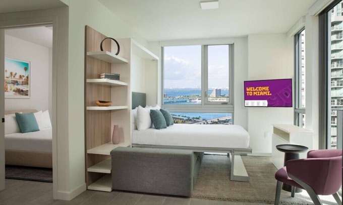 Downtown Miami Condo | Private balcony with panoramic views of Downtown Miami and Biscayne Bay.