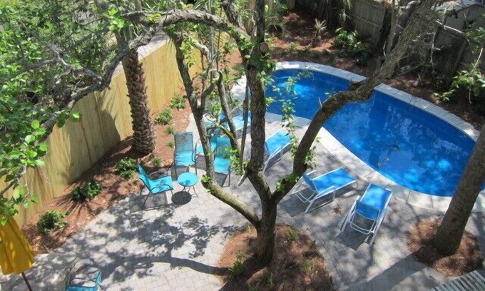 Tybee Island House | Private Pool + Whimsical Sleeping Porch Steps from Beach by Tybee Cottages