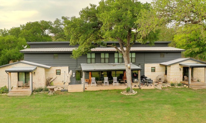 Hunt House | Private Riverfront, HOT TUB, Game room & 4 Patios overlooking the Guadalupe!