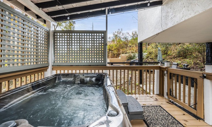 Gatlinburg Cottage | Romantic Couples Cottage with Hot Tub & Fire Pit. 1/4 mile from main strip