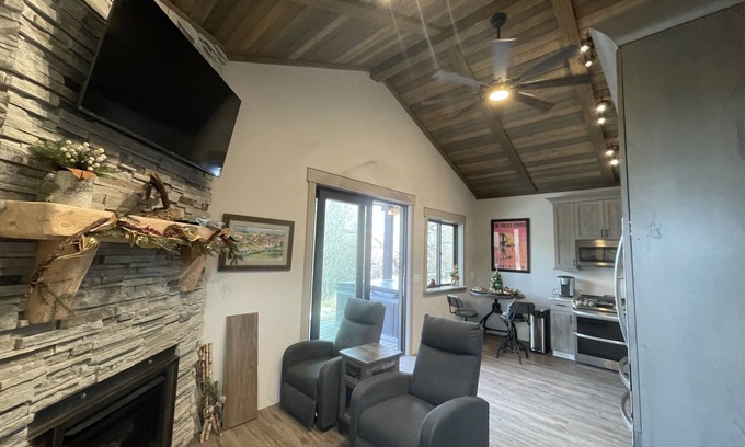 Anaconda Cottage | Romantic River Front Cottage at Old Works Golf Course! Hot Tub and Sauna!