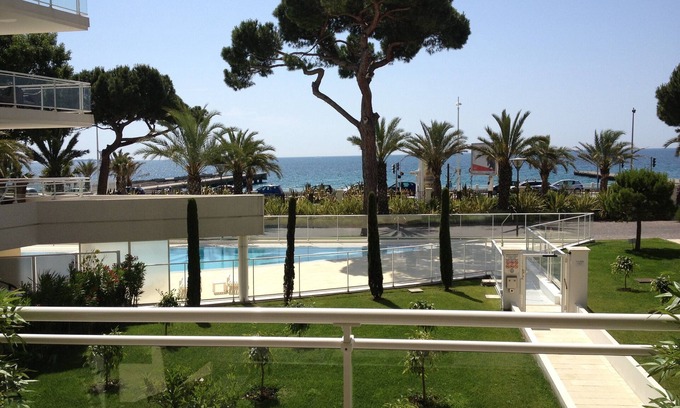 La Bocca Apartment | Royal palm with swimming pools: Apartment with terrace, sea and garden view