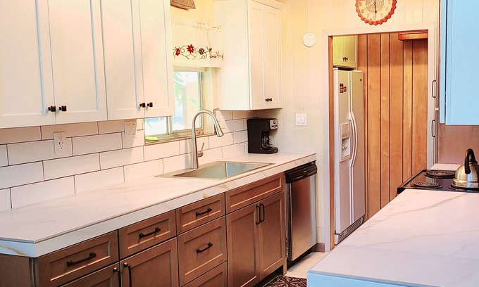 Bass Lake House | Rustic Lakeview Lodge at Bass Lake. Bookable boat slip!