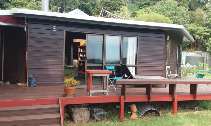 Matapouri House | Sandy Bay overlooking Poor Night Islands you will find Valley of Dreams