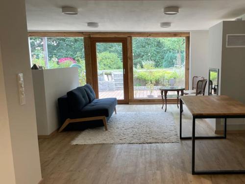 Glosingen Apartment | Schöne Wohnung mit Sonnenterrasse und Kamin