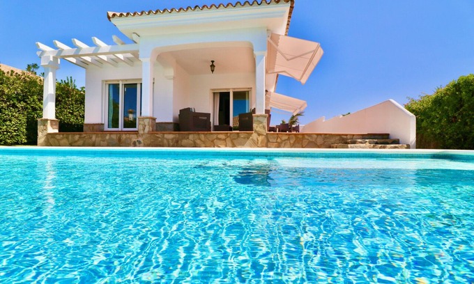 Cabo Roche House | Sea view holiday home with garden and private pool on the sandy beach in Roche