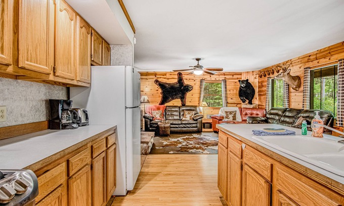 Lac du Flambeau House | Secluded dog-friendly home with dock, woodstove, porch, firepit, kayaks, & bikes