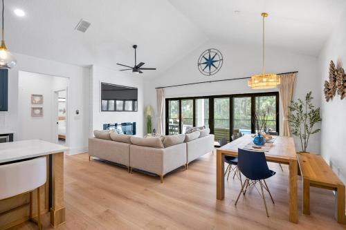 Palm Harbor House | Serene Canal Escape - Heated Pool, Private Dock, Game Room