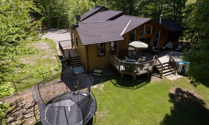 Haliburton Cottage | Serenity Now!nBeautiful Drag Lake. Beach, dock, hot tub and fire pit. Flat lot.