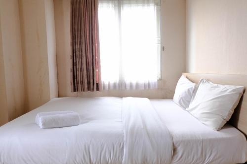 Cileunyi Apartment | Simply Homey 2BR at 11st Floor Pinewood Apartment By Travelio