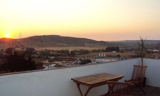 Budens House | Small multi-storey house with beautiful roof terrace, involved in village life