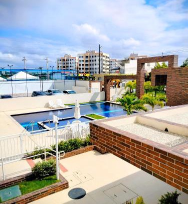 Aruanda Apartment | Sol Prime Aracaju - 2 quartos com ar - vista piscina - a 6 minutos da praia de Aruana