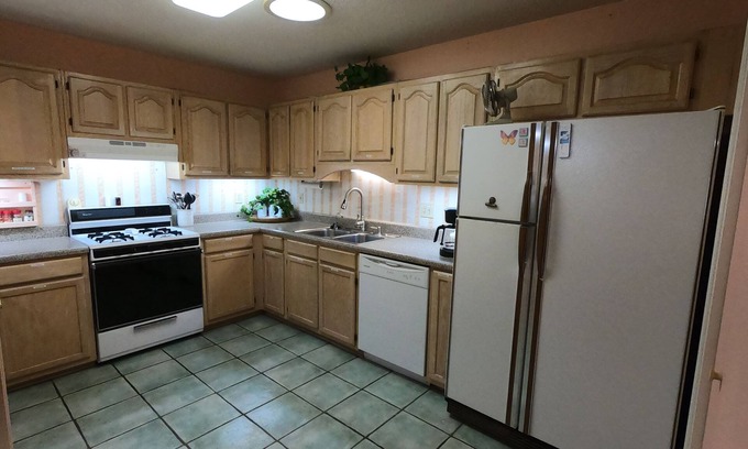 Tillmans Corner House | Southern Garden Home in Tillman's Corner, 16 min to downtown Mobile.