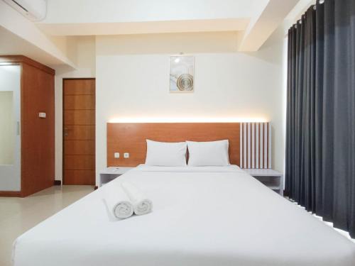 Panakkukang Apartment | Spacious and Comfortable 3BR Vida View Makassar Apartment By Travelio