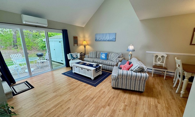 Brewster Condo | Spacious, renovated and beautifully decorated Howland Village townhouse with straight staircase