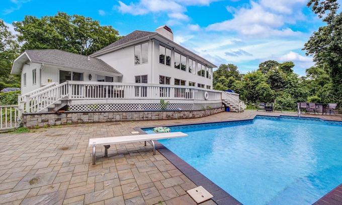 Hampton Bays House | Sprawling sun-lit home with private heated pool, arcade, air hockey, & grill