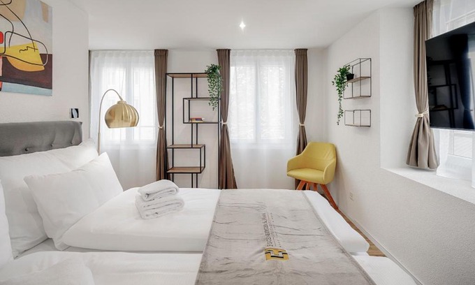 St. Gallen Apartment | St Georgen-Strasse Studios by VISIMO - Design, City, Nature