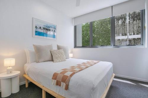 Palm Beach Apartment | Starlit Palms - Chic Poolside Haven by the Beach