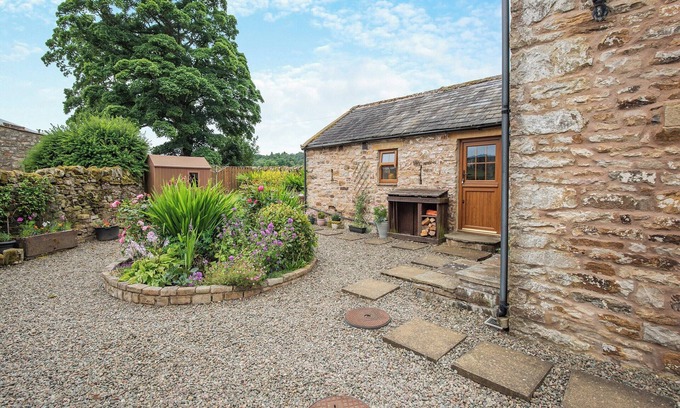 Alston Cottage | Stone built barn conversion with cosy living spaces and stunning fell views.