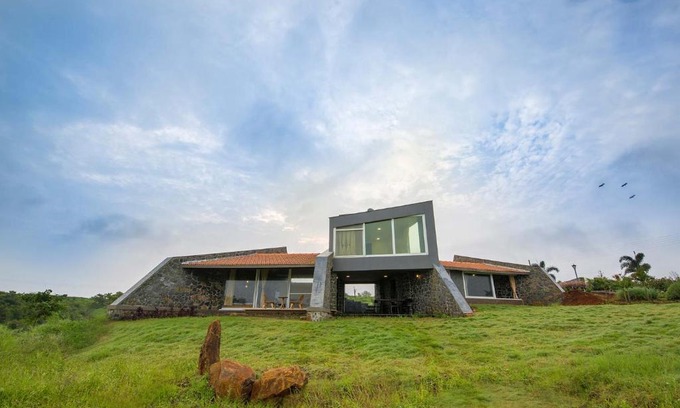 Nashik Villa | Stone House Bezze by StayVista with Lake view, Jacuzzi & Lawn - your perfect getaway