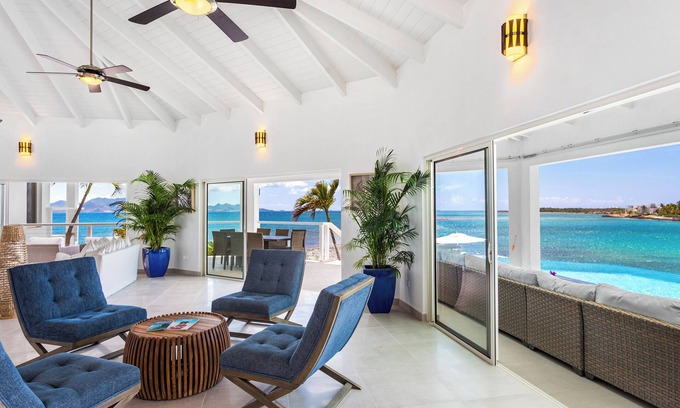 The Valley Villa | Stunning 6 bedroom waterfront villa with wooden dock