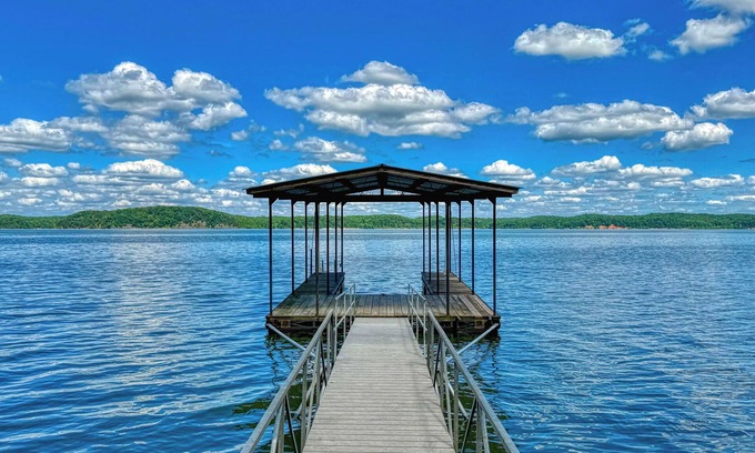 New Concord House | Stunning lakefront home with private dock, screened in porch and firepit