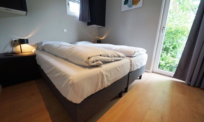 Susteren House | Stunning private villa for 4 guests with WIFI, pool, TV, terrace and parking