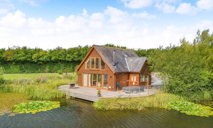 Menai Bridge Ski Chalet | Stunning two storey contemporary lodge on the edge of the lake.