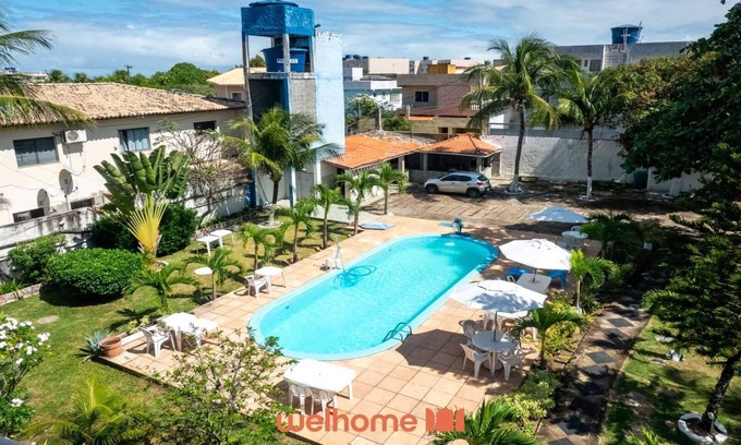 Itapua House | Suíte em Itapuã próximo a Praia e do Farol