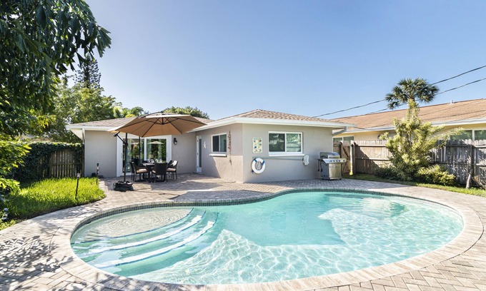 Naples Park House | SUMMER PROMOTION! Cute Designer Home, Heated Pool Oasis, Near Beach, FREE Bikes