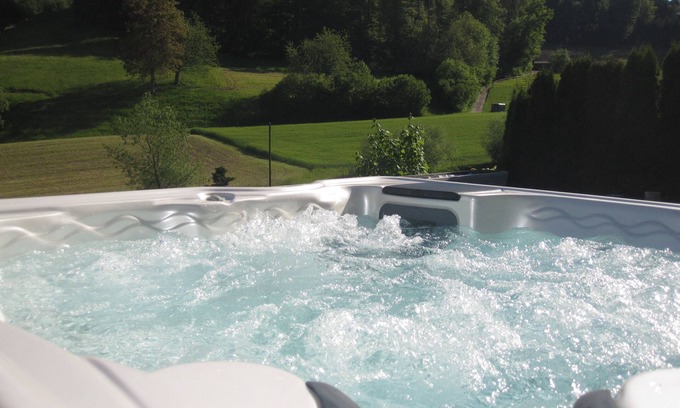 Kulm Apartment | Sun terrace with Jacuzzi & shower experience with views of woods & meadows