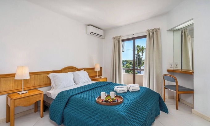 Alpouvar Apartment | Sunny Flat with a Balcony and Pool by HostWise