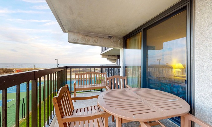 North Ocean City Condo | Sunny, inviting condo near the beach with balcony, pools & gym