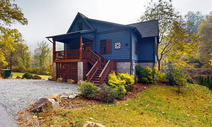 Cullowhee House | Take in the natural beauty from this elegant riverfront home
