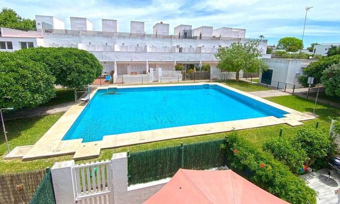 Conil de la Frontera Cottage | Terraced house with shared pool in residential area in Conil, sleeps 5