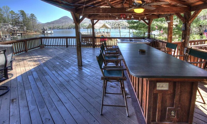 Clarkesville House | The Cove at Lake Burton | Vintage Lakefront Home with Covered Boathouse Deck