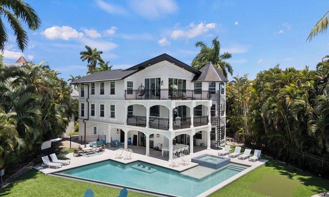 Biggar House | The Sunset Escape: Riverfront Elegance with Pool