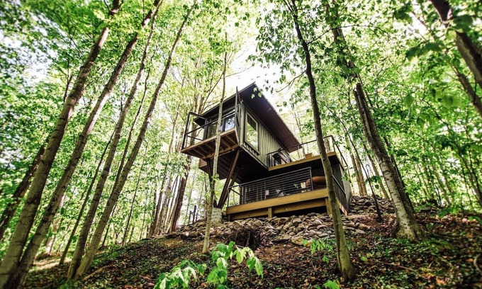 Charlevoix House | The Treehouse escape is set amidst 55 acres of natural beauty