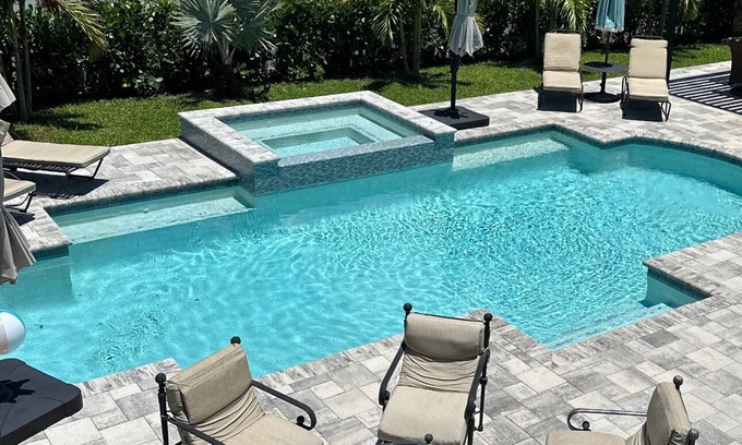 Naples Park House | This large property was fully renovated new heated salt water pool and spa