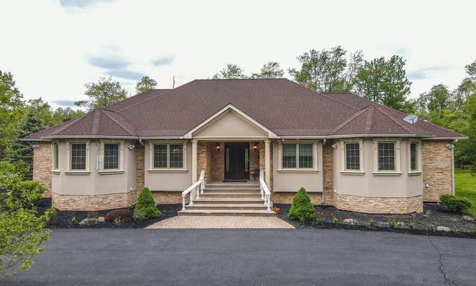 Tobyhanna Villa | Tranquil Oasis Luxe Villa with Theater and Hot Tub