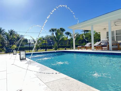 Riverside Villa | Tranquil Villa with Heated Salt Pool, Bar, & Lanai