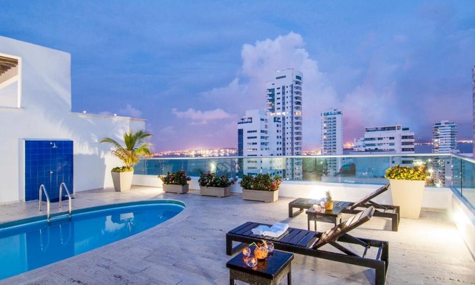 Castillogrande Apartment | Travelers Orange Cartagena