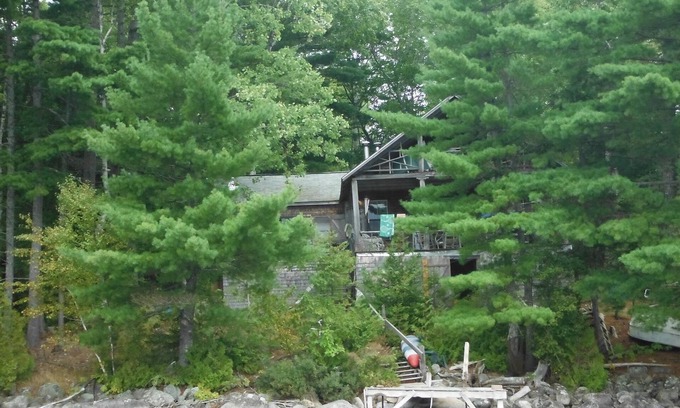 Forest CIty Cottage | Turn Of The Century Cabin On Private Island